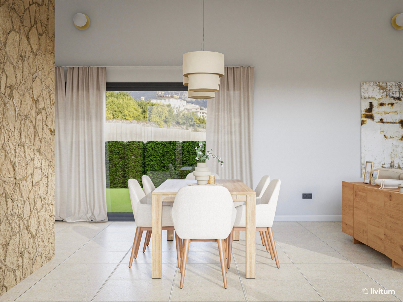 Comedor y salón rústico con pared de piedra 