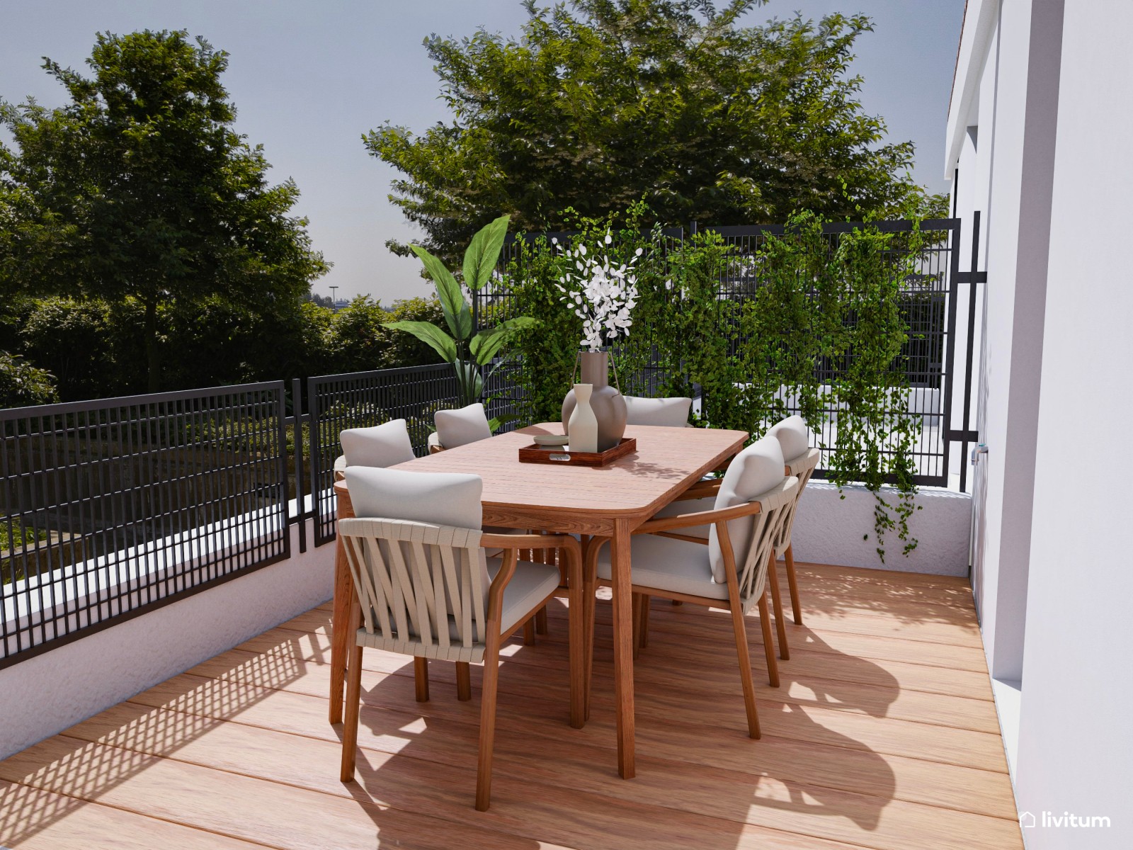 Cómoda terraza en madera y tonalidades de blanco