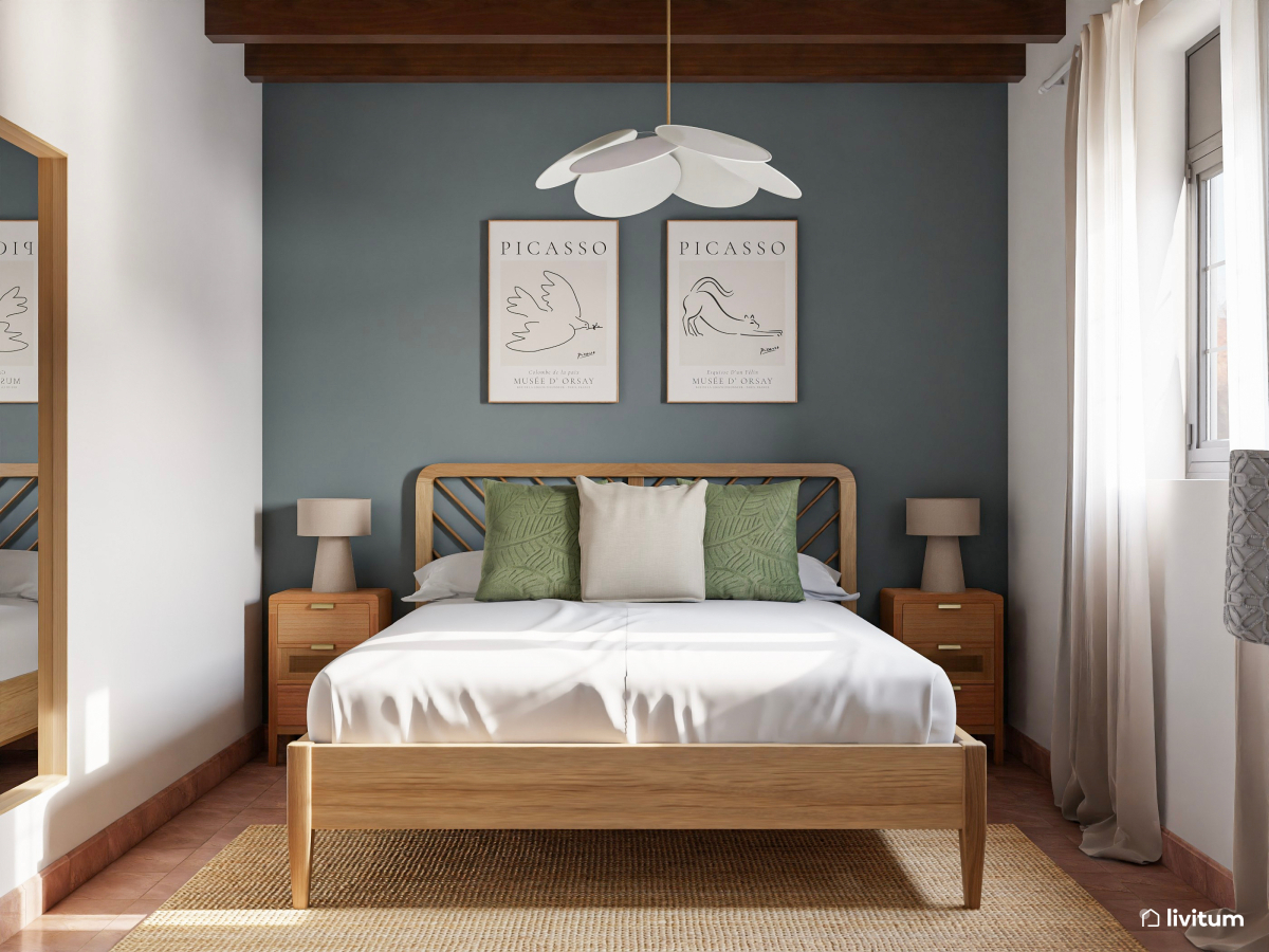 Dormitorio con pared de acento en azul piedra y toques verdes