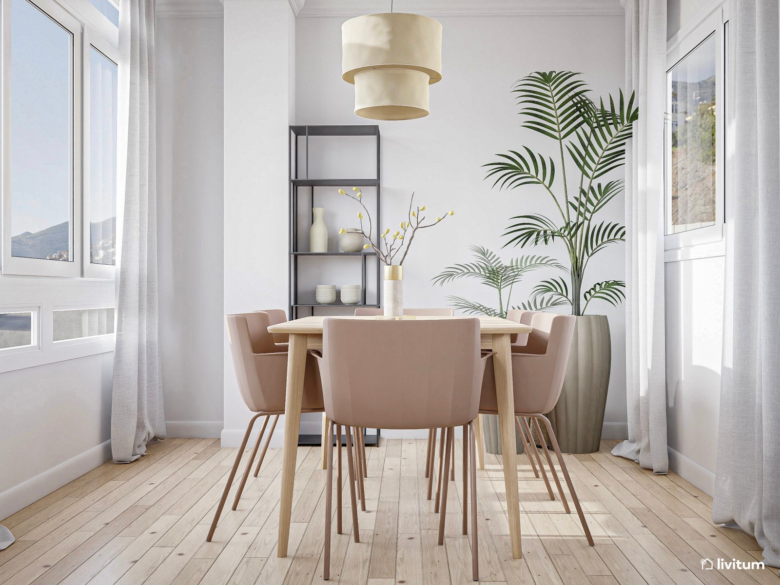 Salón comedor elegante con detalles en negro y rosa palo