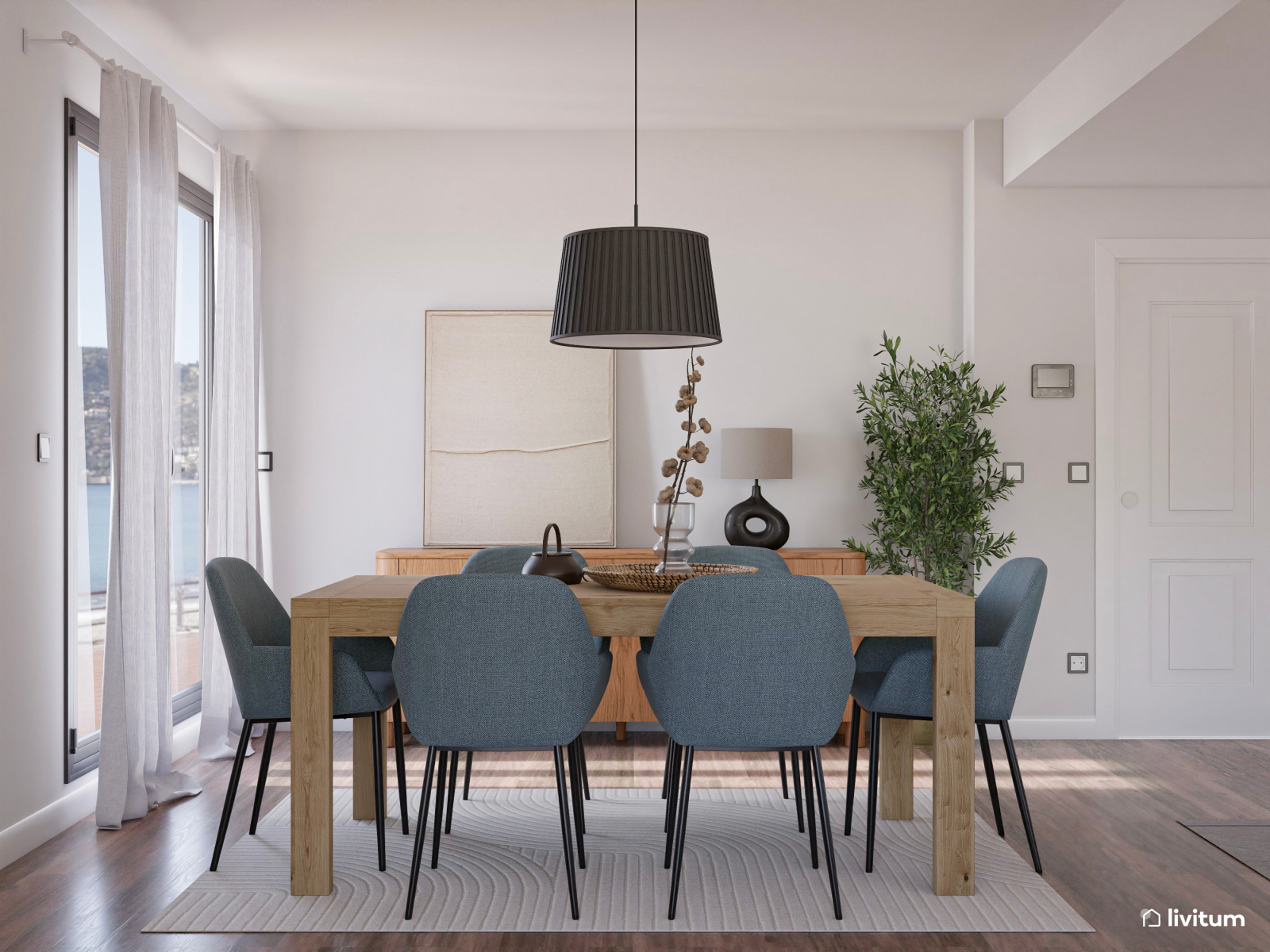 Salón comedor moderno con toques de azul índigo y cocina abierta